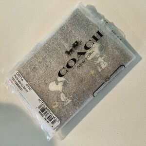 Coach X Peanuts Mini Skinny Id Case In Signature Canvas With Snoopy Print